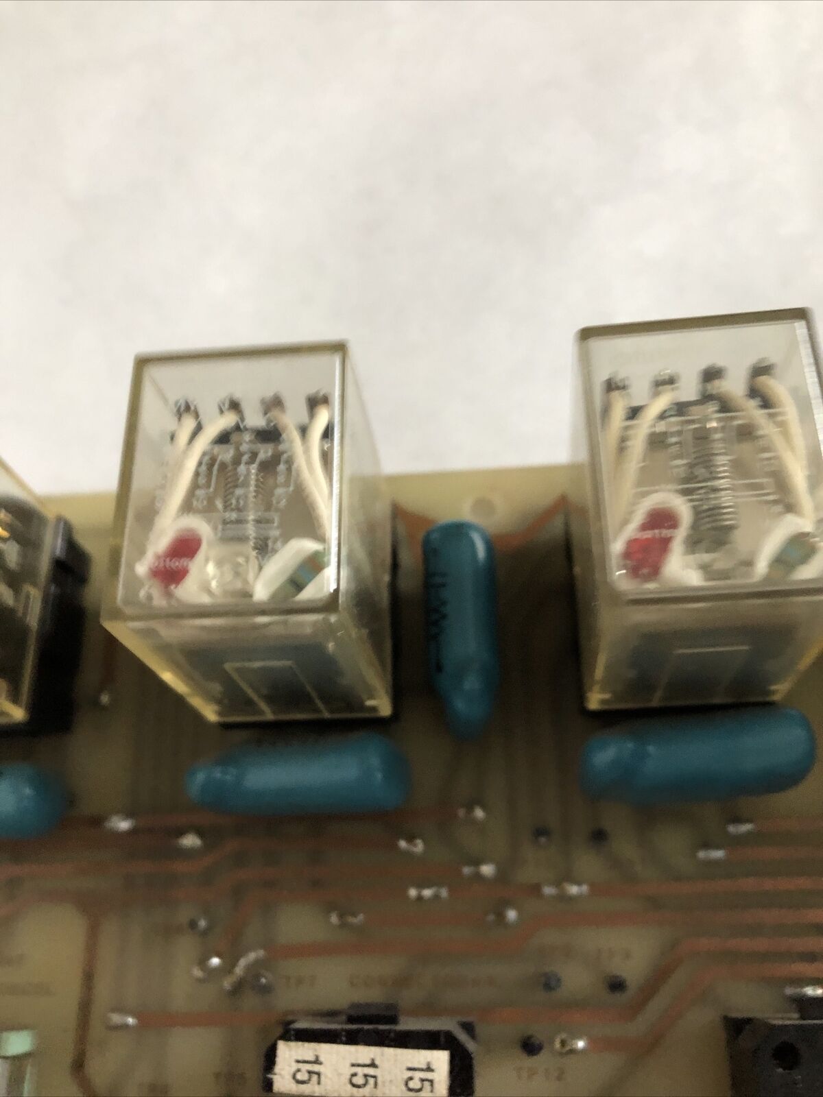 See Schematic D-03M189 Relay Logic P.C.B. D-07Mioo,D-07M100,Omron My4-Us,Fj