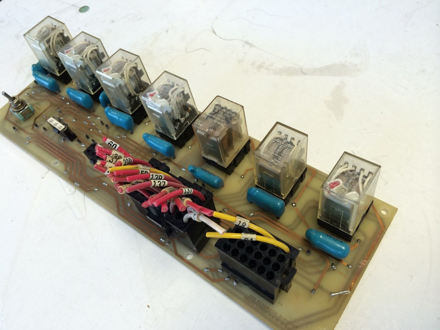 See Schematic D-03M189 Relay Logic P.C.B. D-07Mioo,D-07M100,Omron My4-Us,Fj