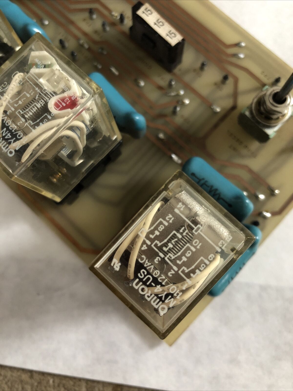 See Schematic D-03M189 Relay Logic P.C.B. D-07Mioo,D-07M100,Omron My4-Us,Fj
